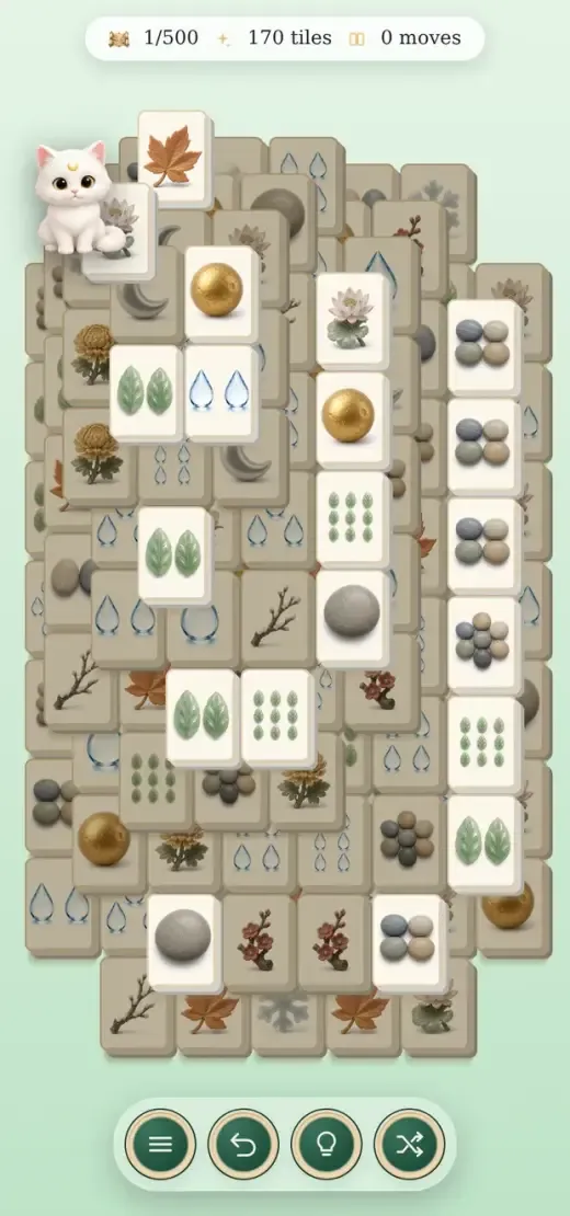 Mahjong Moonwindow: a stacked board of pale tiles with leaves, stones and seeds.